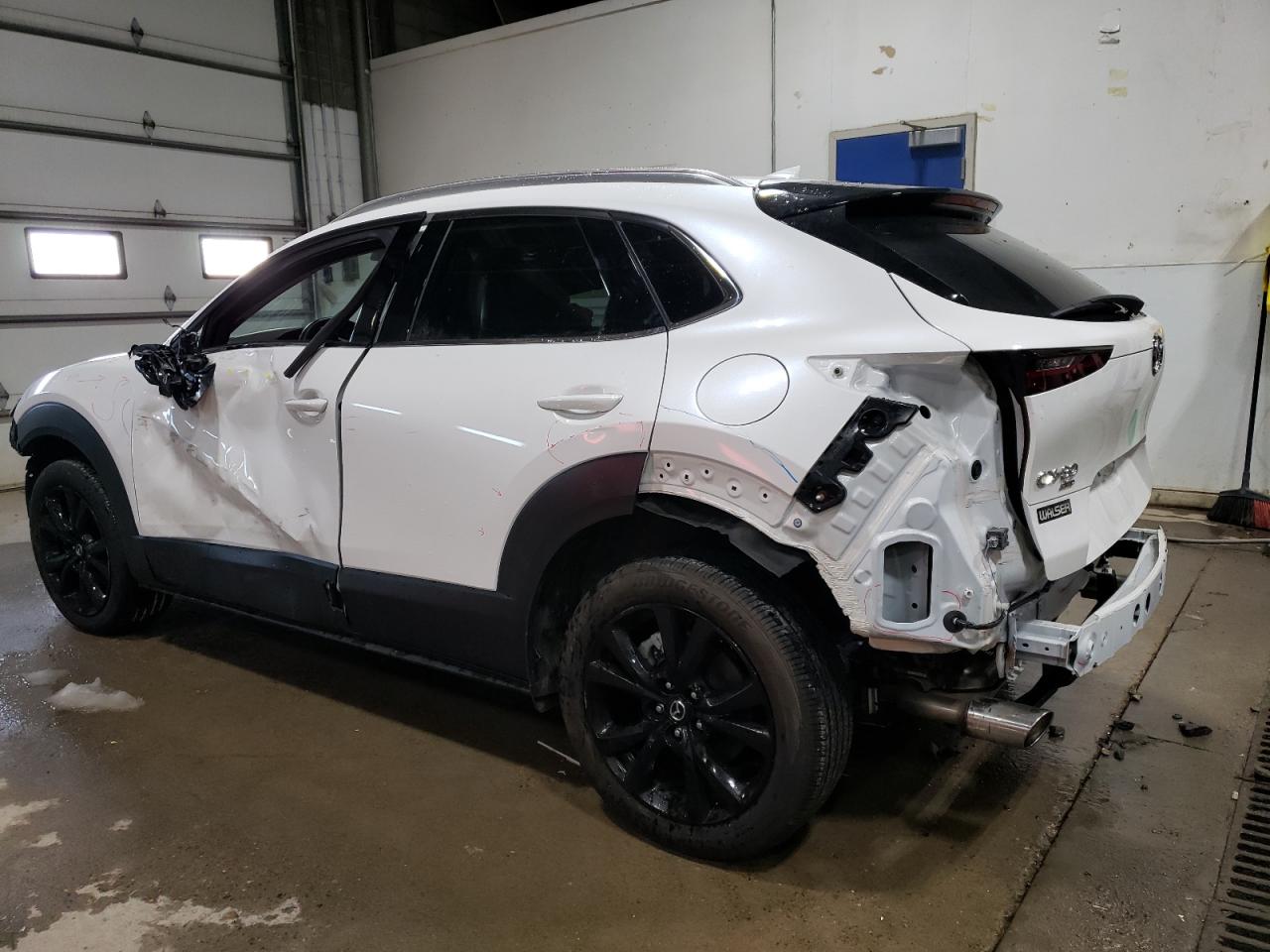 2023 Mazda CX-30 VIN 3MVDMBEY3PM587798 Copart auction photo, all over damage thumbnail 2