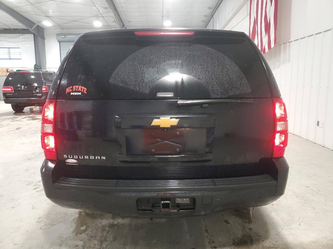 2014 Chevrolet Suburban VIN 1GNSKJE78ER239031 Copart auction photo, side damage thumbnail 6