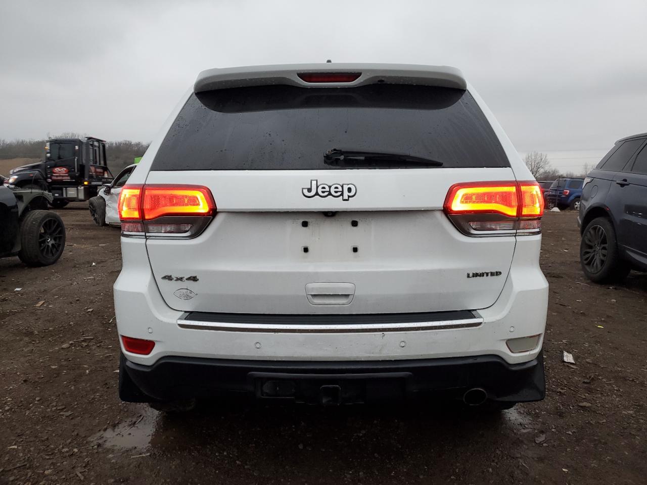 2015 Jeep Grand Cherokee VIN 1C4RJFBG9FC617230 Copart auction photo, side damage thumbnail 6