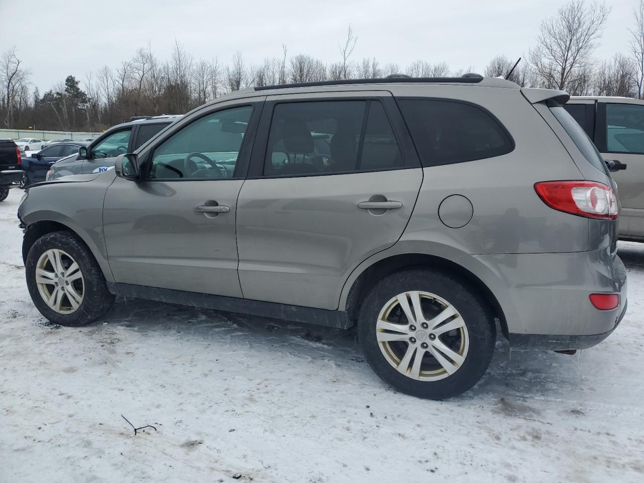 2012 Hyundai Santa Fe VIN 5XYZHDAG5CG144077 Copart auction photo, front end damage thumbnail 2