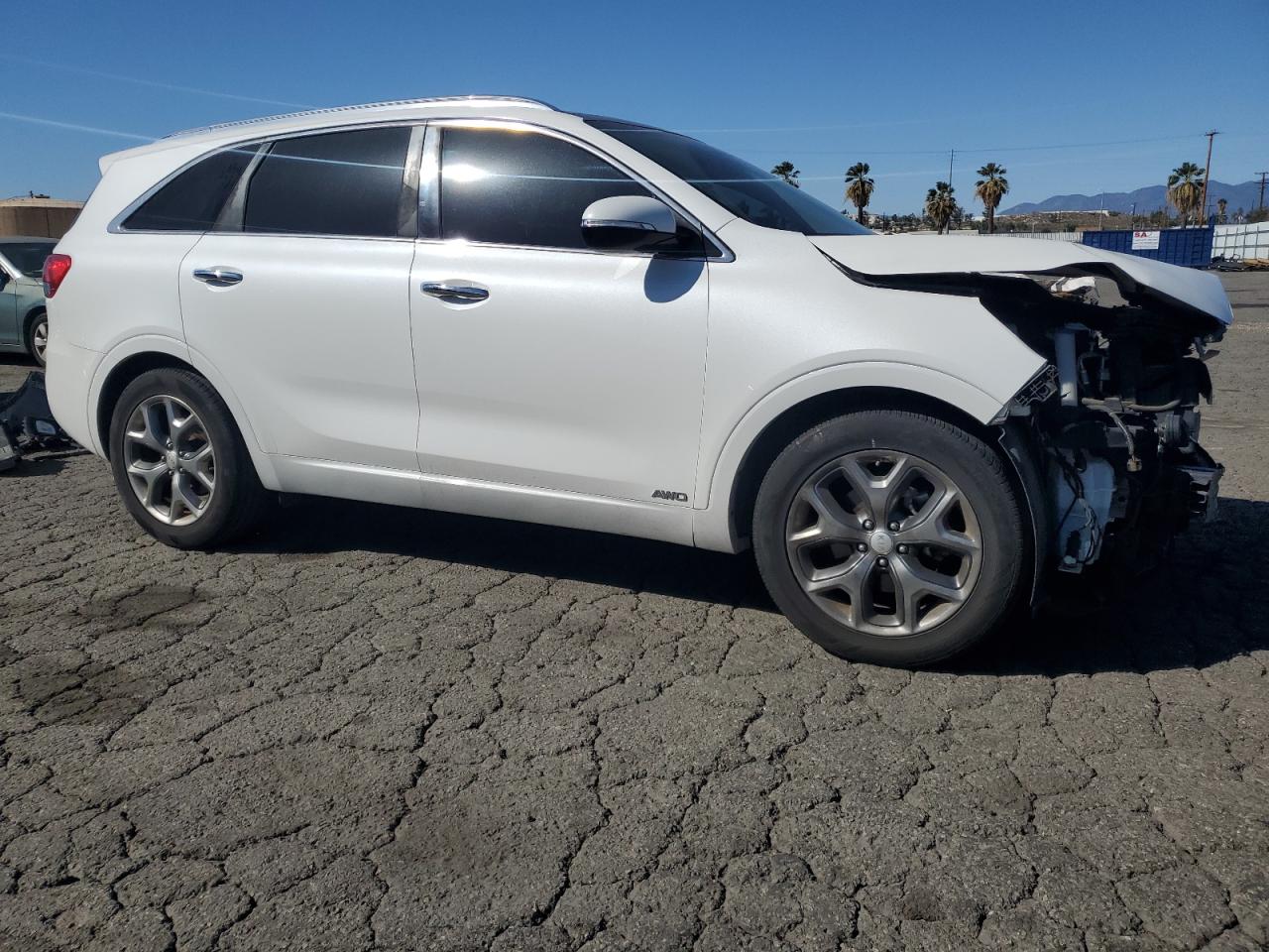 2016 KIA Sorento VIN 5XYPKDA50GG151368 Copart auction photo, front end / side damage thumbnail 4
