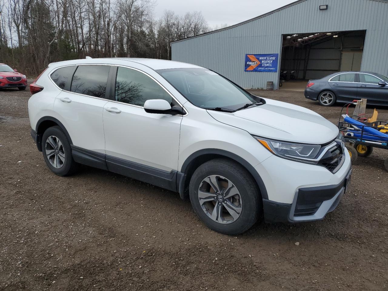 2021 Honda CR-V VIN 2HKRW1H28MH002489 Copart auction photo, side / front end damage thumbnail 4