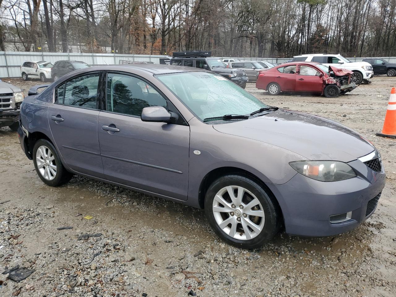 2007 Mazda 3 VIN JM1BK12F971641307 Copart auction photo, side / rear end damage thumbnail 4
