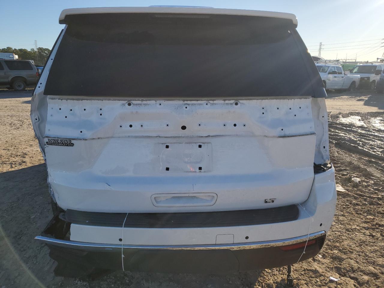 2021 Chevrolet Tahoe VIN 1GNSCNKD2MR386197 Copart auction photo, rear end / undercarriage damage thumbnail 6