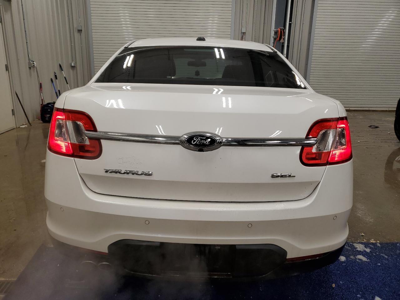 2012 Ford Taurus VIN 1FAHP2EW9CG110943 Copart auction photo, front end / side damage thumbnail 6