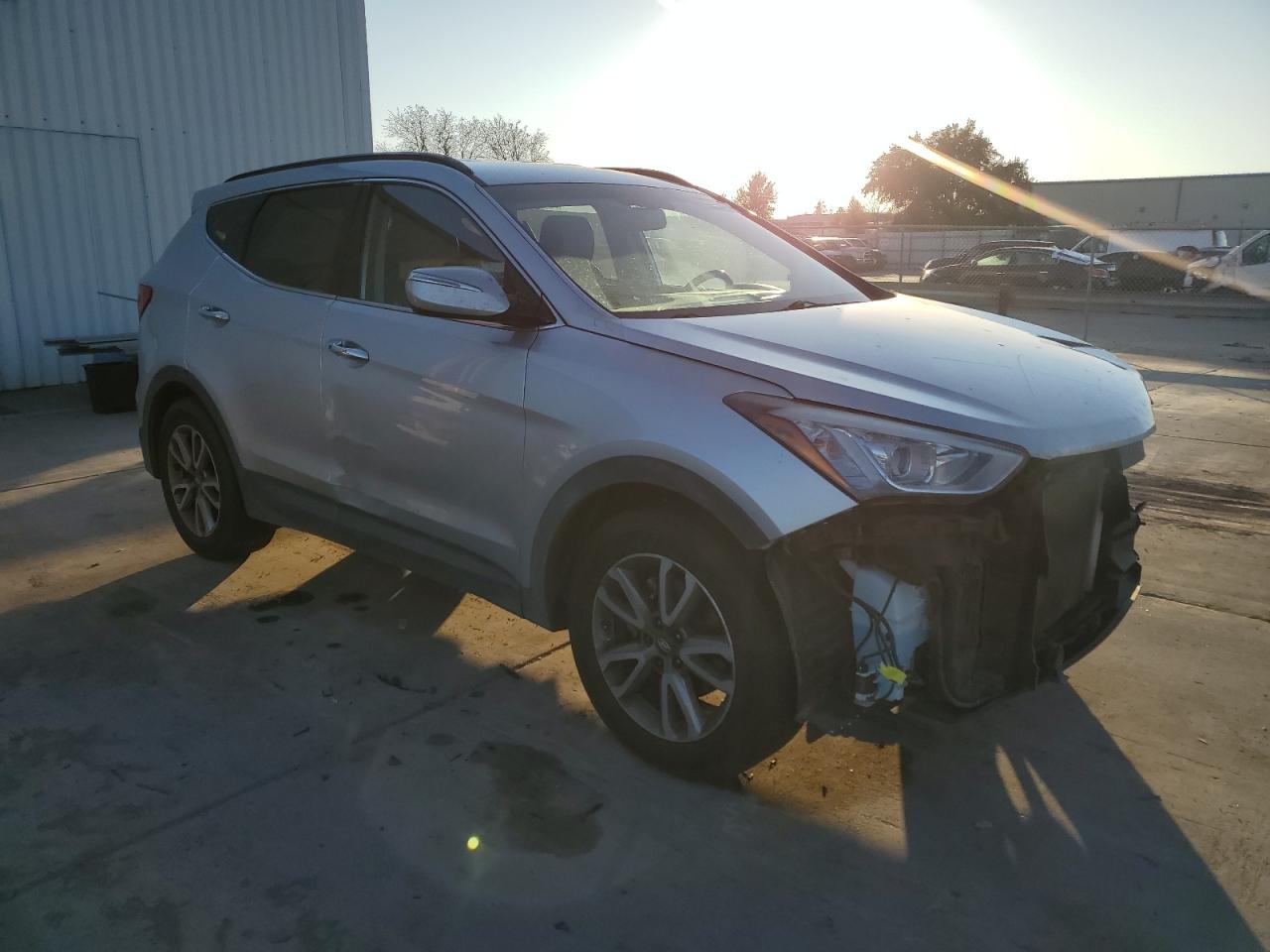 2015 Hyundai Santa Fe VIN 5XYZUDLA8FG287436 Copart auction photo, front end / side damage thumbnail 4