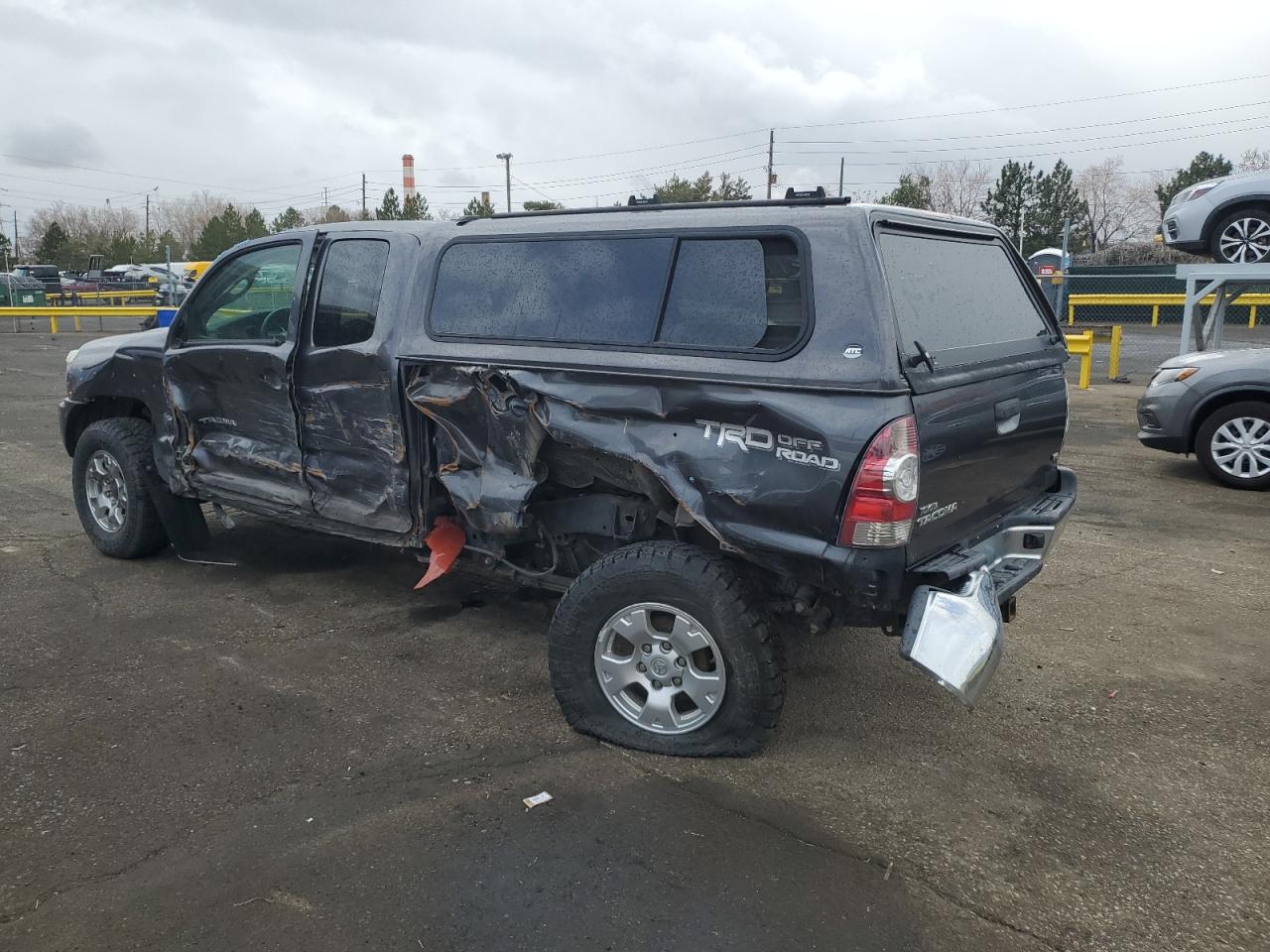 2015 Toyota Tacoma VIN 5TFUU4ENZFX121863 Copart auction photo, all over damage thumbnail 2