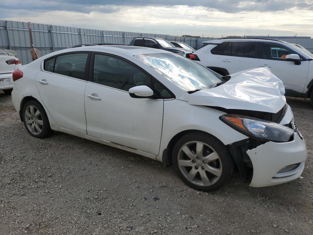 2015 KIA Forte VIN KNAFZ4A80F5412049 Copart auction photo, front end / hail damage thumbnail 4
