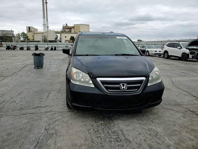 2005 Honda Odyssey VIN 5FNRL38705B115773 Copart auction photo, side / front end damage thumbnail 12