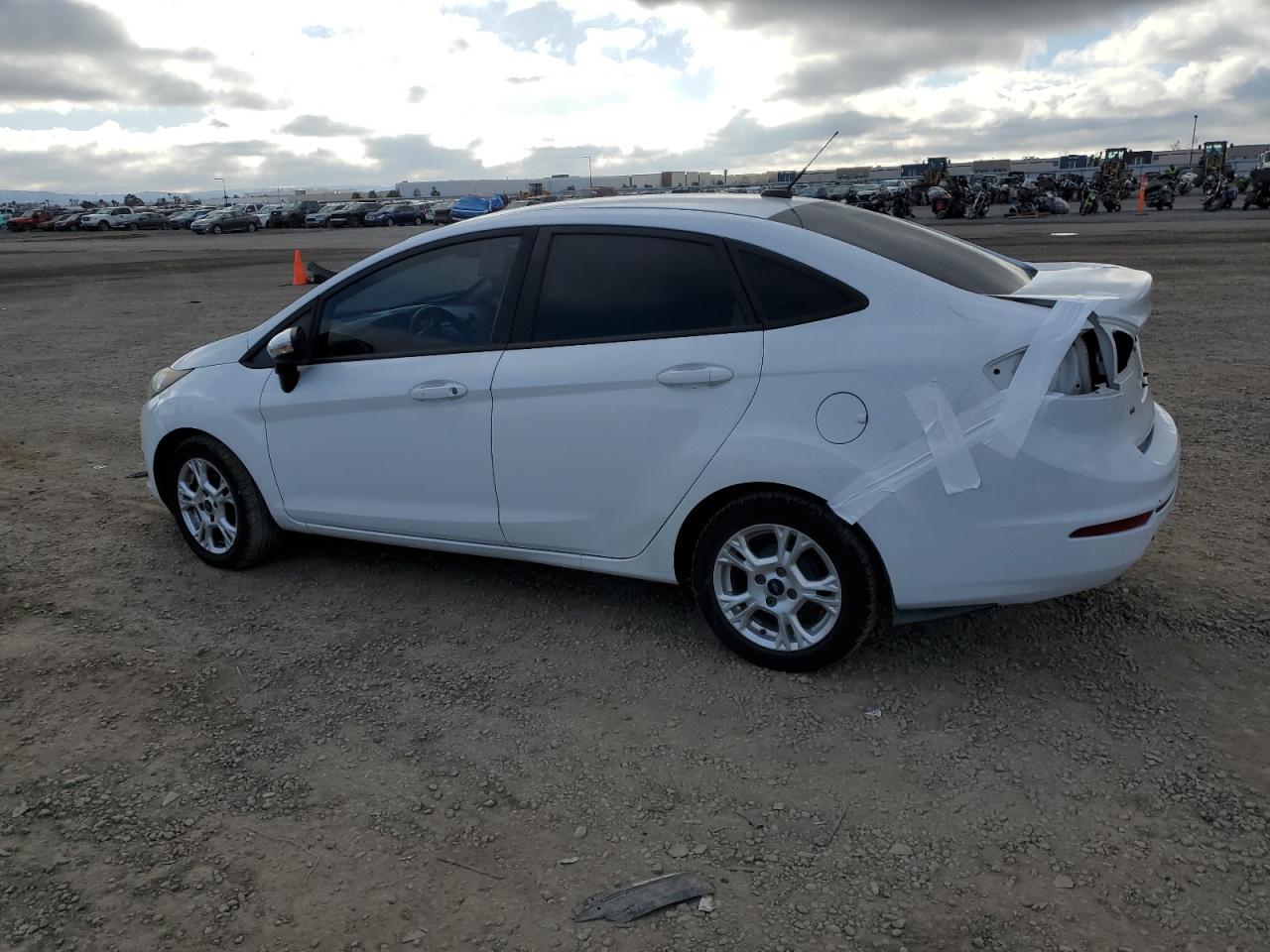 2016 Ford Fiesta VIN 3FADP4BJ3GM100830 Copart auction photo, rear end damage thumbnail 2