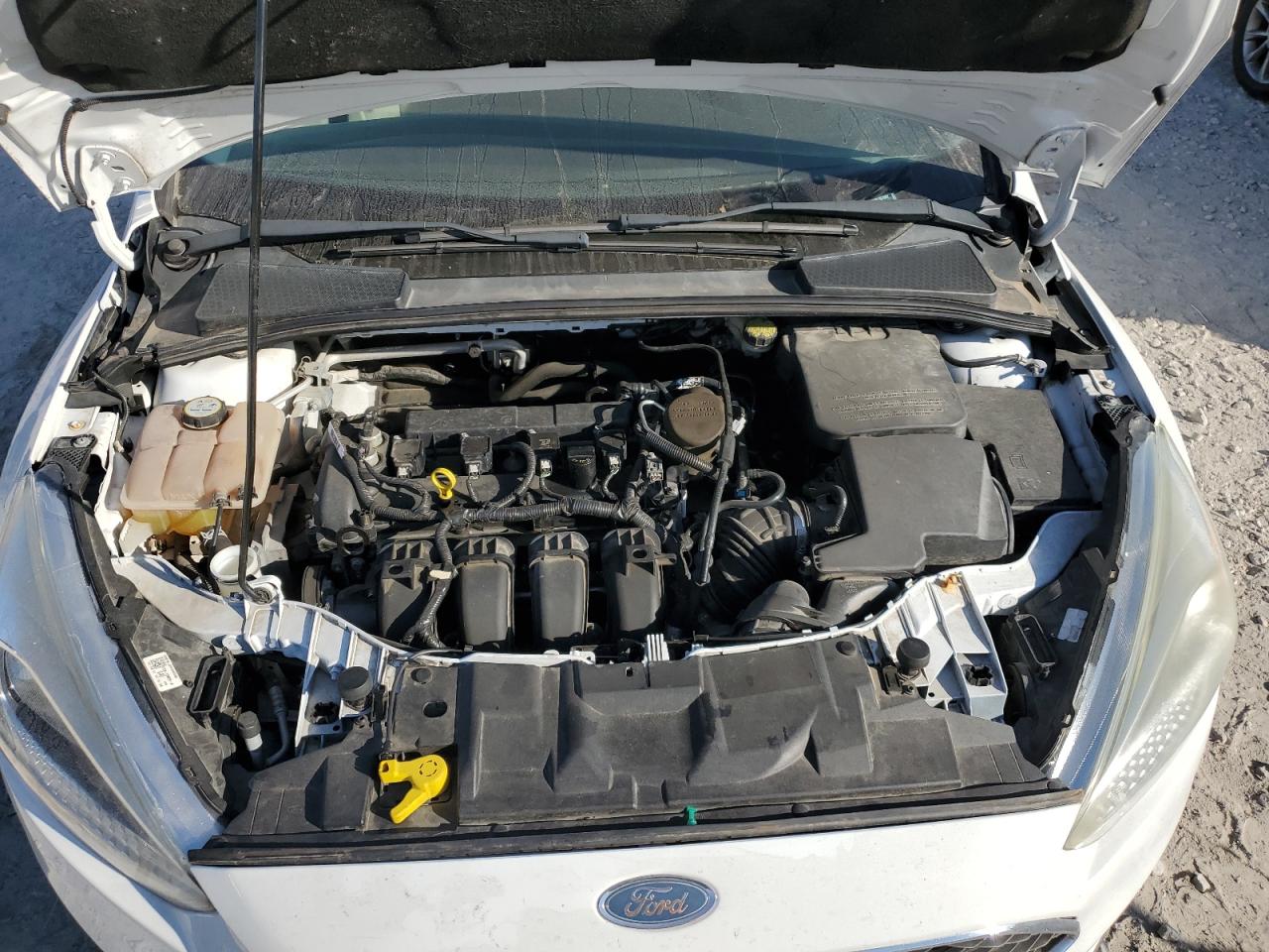 2015 Ford Focus VIN 1FADP3F2XFL351082 Copart auction photo, hail / rear end damage thumbnail 11