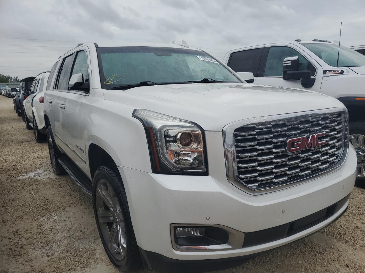 2019 GMC Yukon VIN 1GKS1CKJ0KR395653 Copart auction photo, water/flood damage thumbnail 4