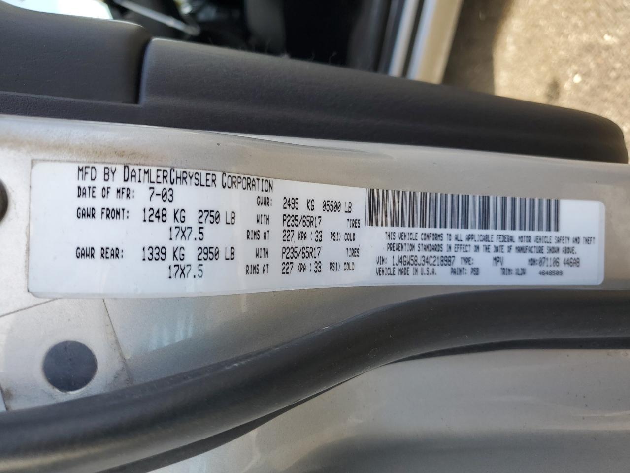 2004 Jeep Grand Cherokee VIN 1J4GW58J34C218987 Copart auction photo, side / undercarriage damage thumbnail 12