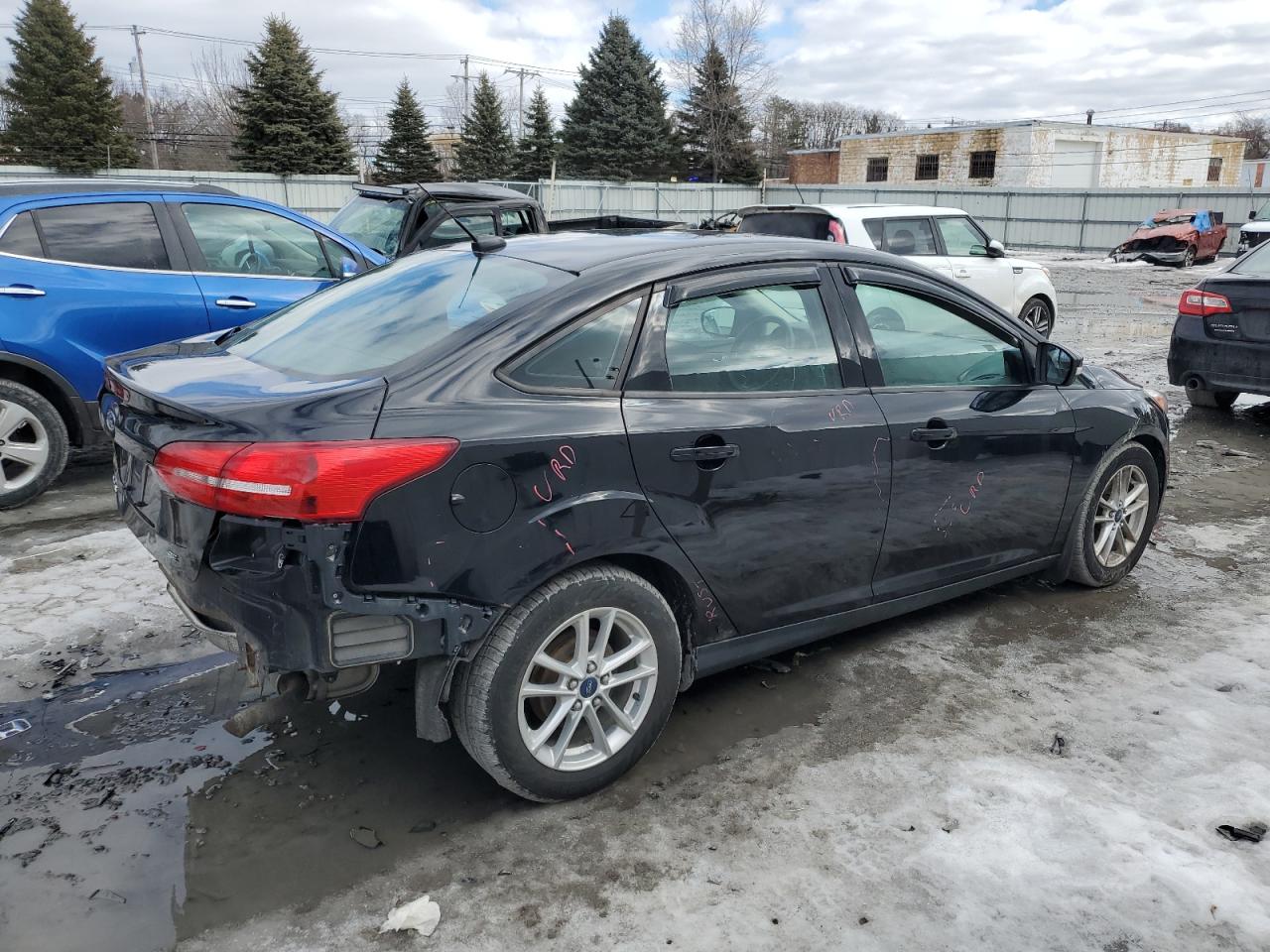 2016 Ford Focus VIN 1FADP3F21GL218812 Copart auction photo, rear end / minor dent/scratches damage thumbnail 3