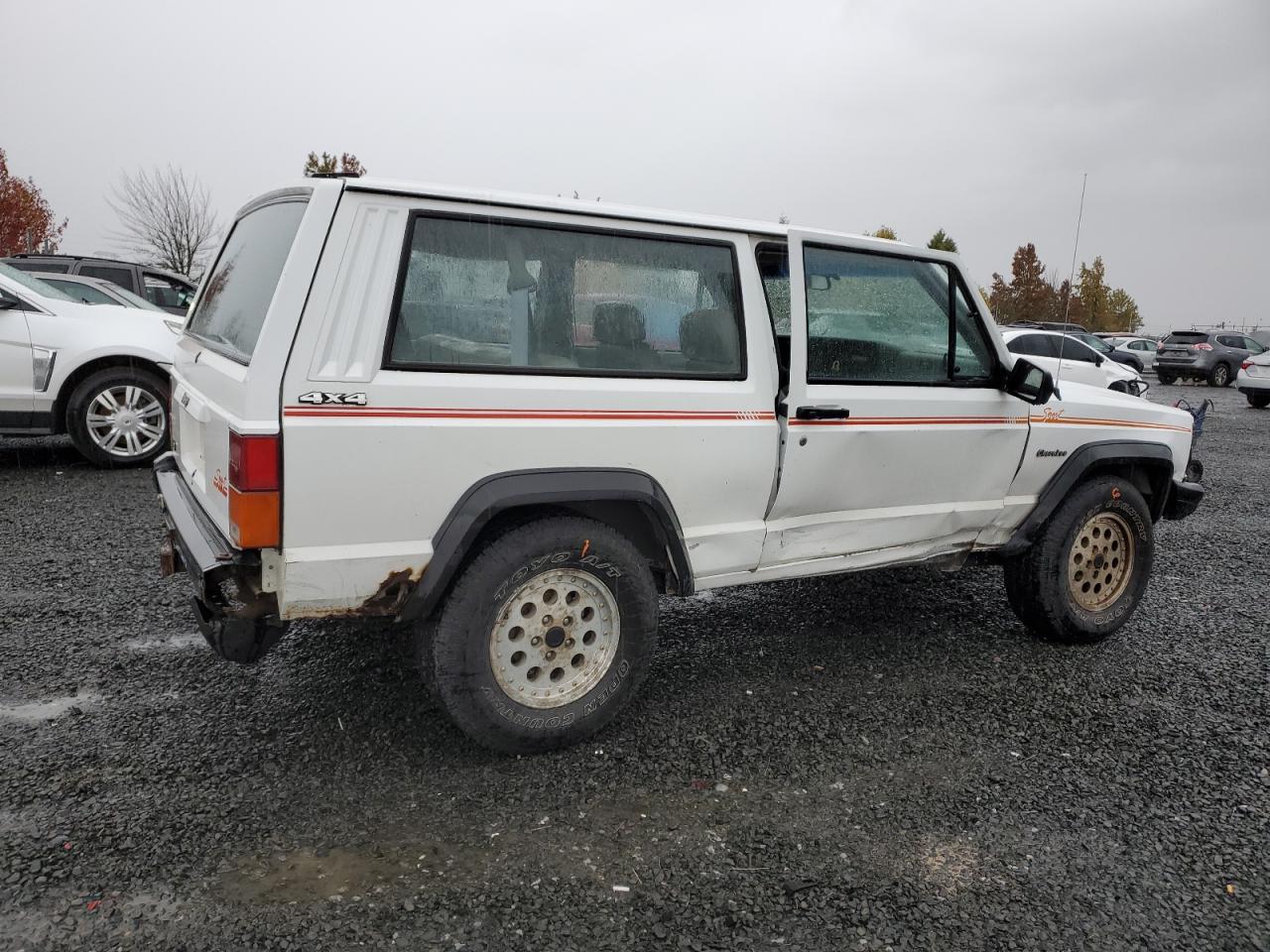 1991 Jeep Grand Cherokee VIN 1J4FJ87S8ML544256 Copart auction photo, side damage thumbnail 3
