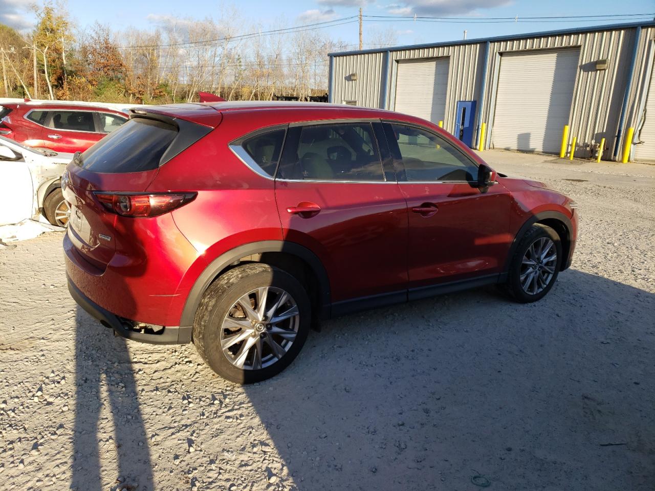 2019 Mazda CX-5 VIN JM3KFBDM6K0501212 Copart auction photo, side / minor dent/scratches damage thumbnail 3