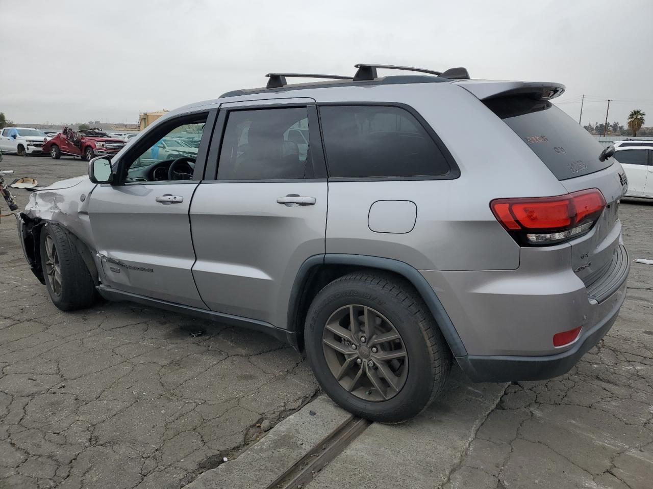 2016 Jeep Grand Cherokee VIN 1C4RJFAG1GC457430 Copart auction photo, front end / side damage thumbnail 2