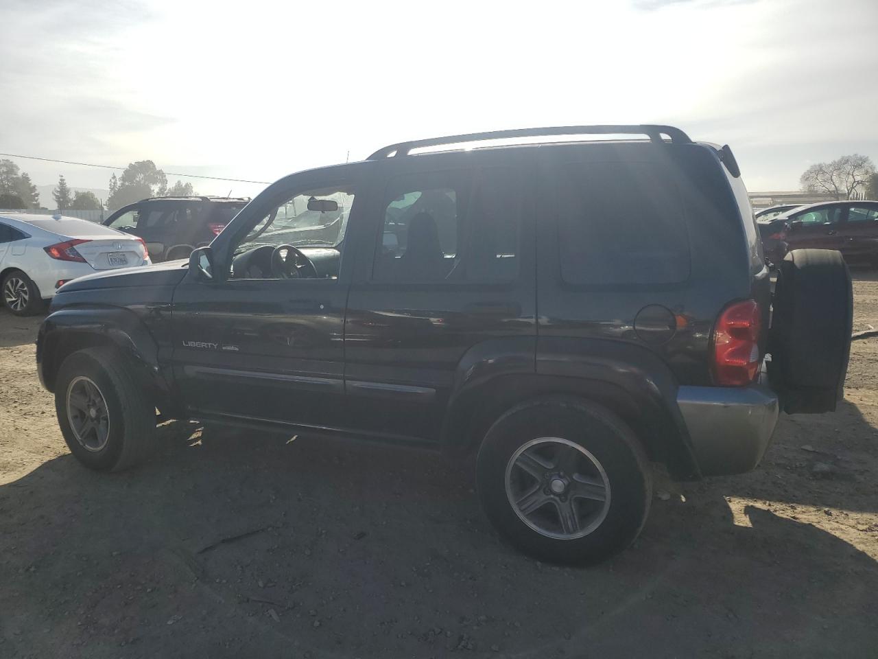 2004 Jeep Liberty (North America) VIN 1J4GK48K14W278702 Copart auction photo, side / front end damage thumbnail 2