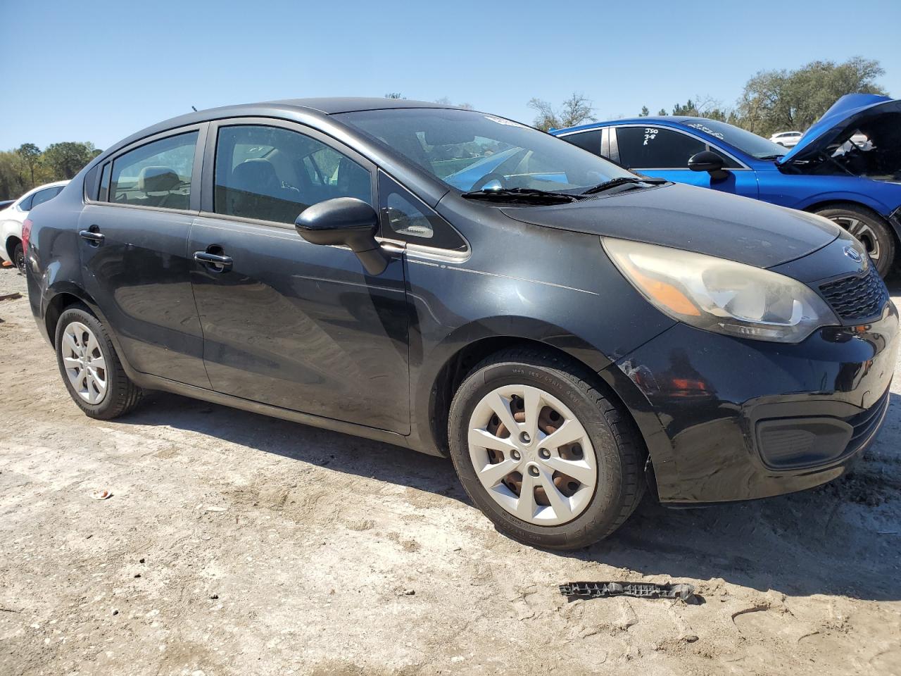 2014 KIA Rio VIN KNADM4A35E6351672 Copart auction photo, minor dent/scratches damage thumbnail 4