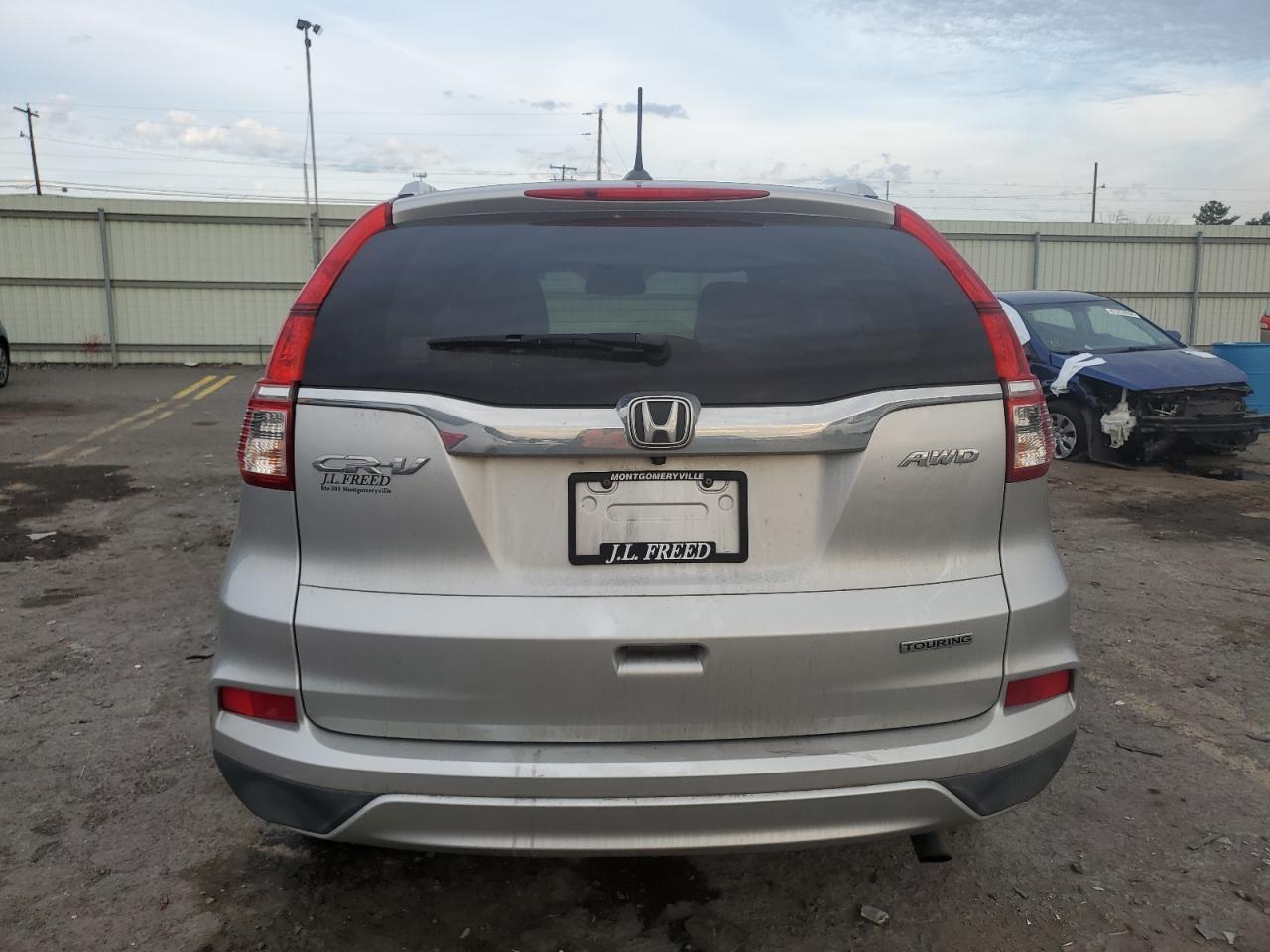 2016 Honda CR-V VIN 5J6RM4H9XGL134085 Copart auction photo, front end / side damage thumbnail 6