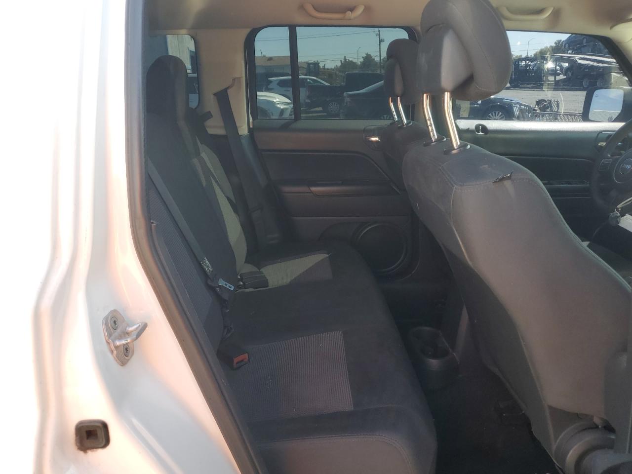 2012 Jeep Liberty (Patriot) VIN 1C4NJPBA7CD639216 Copart auction photo, rear end damage thumbnail 11