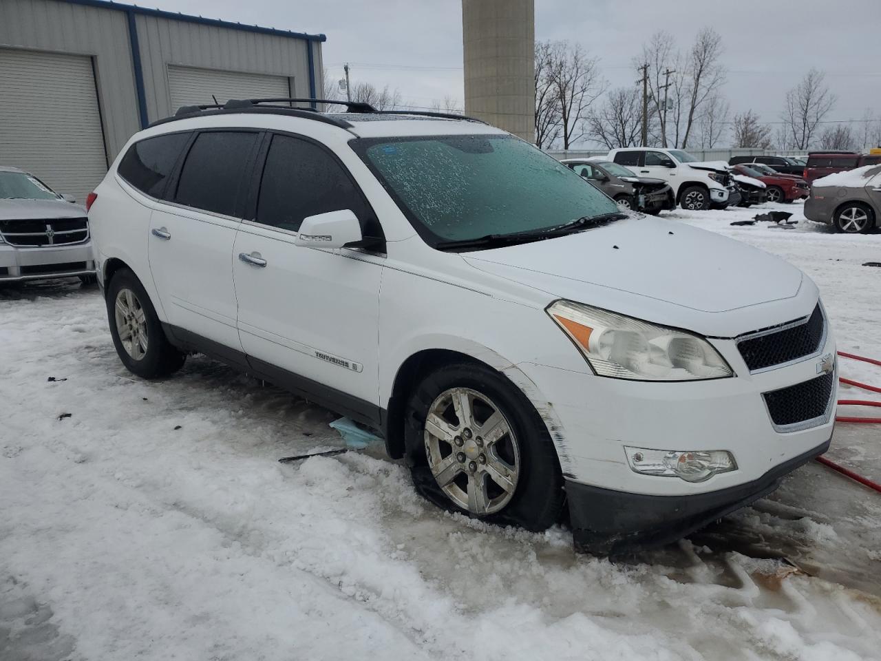 2009 Chevrolet Traverse VIN 1GNER23D59S112310 Copart auction photo, front end damage thumbnail 4