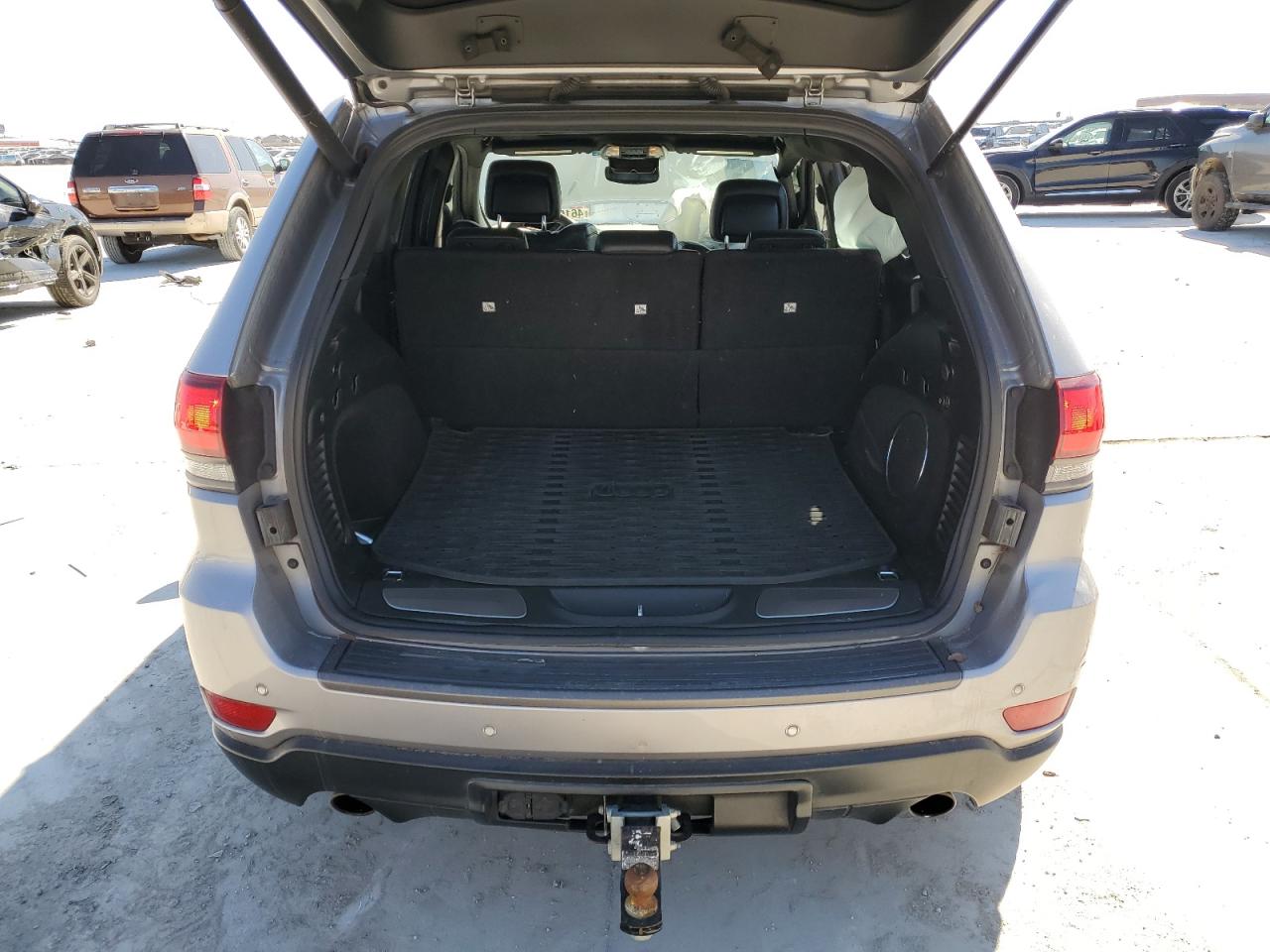 2018 Jeep Grand Cherokee VIN 1C4RJFLGXJC311323 Copart auction photo, front end / side damage thumbnail 6