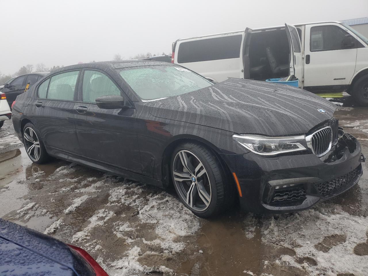2017 BMW 7er VIN WBA7F2C36HG422918 Copart auction photo, front end damage thumbnail 4