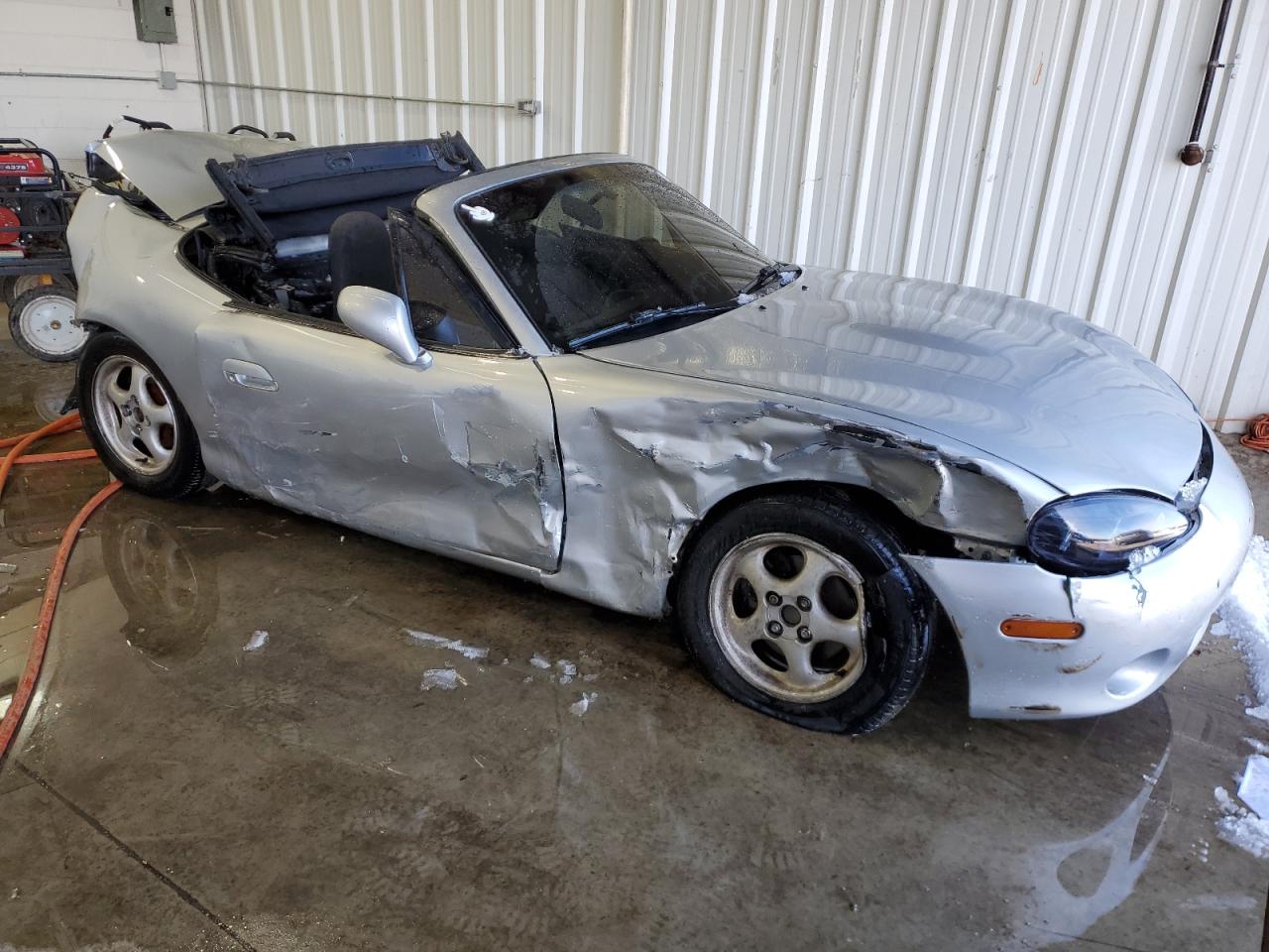 1999 Mazda MX-5 VIN JM1NB3536X0134025 Copart auction photo, all over damage thumbnail 4