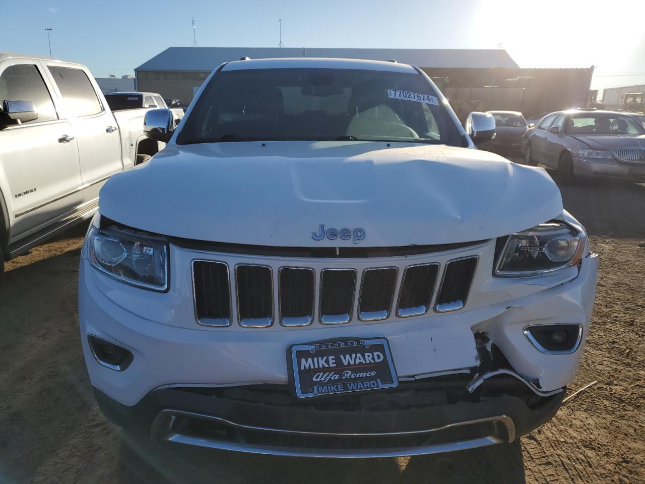 2015 Jeep Grand Cherokee VIN 1C4RJFBG7FC243460 Copart auction photo, front end / side damage thumbnail 5