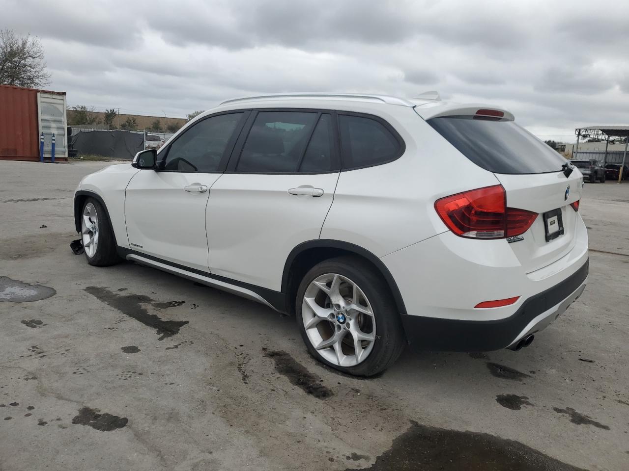 2015 BMW X1 VIN WBAVM1C54FVW56864 Copart auction photo, front end / side damage thumbnail 2