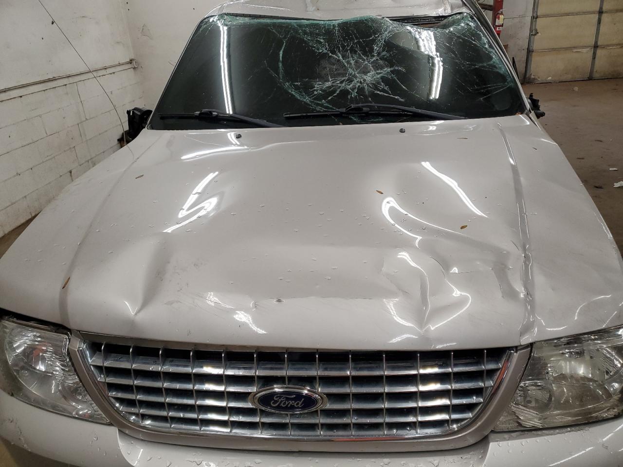 2004 Ford Explorer VIN 1FMDU75W94UB68922 Copart auction photo, rollover damage thumbnail 13