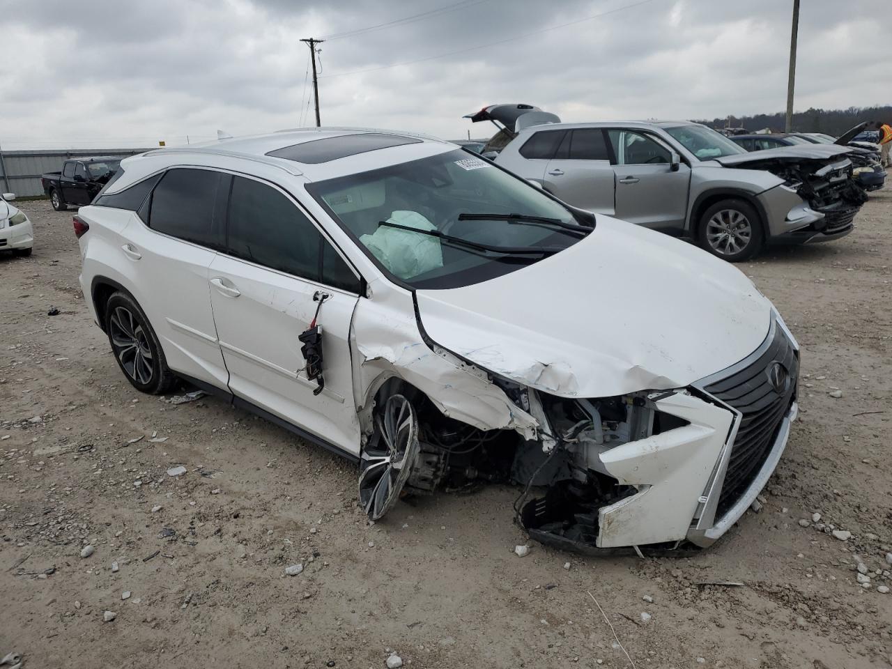2019 Lexus RX VIN 2T2ZZMCA9KC128217 Copart auction photo, biohazard/chemical / side damage thumbnail 4