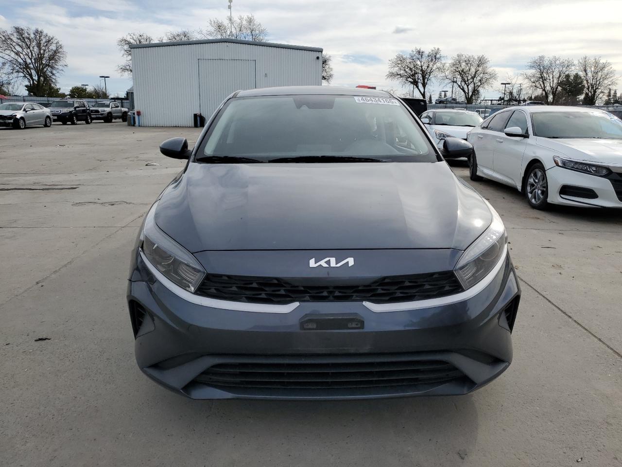 2023 KIA Forte VIN 3KPF24AD8PE544969 Copart auction photo, side / front end damage thumbnail 5