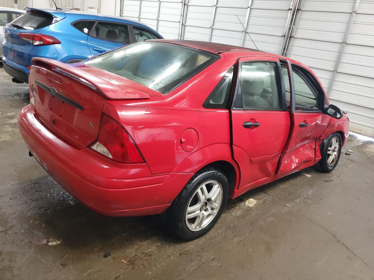 2001 Ford Focus VIN 1FAFP34321W109530 Copart auction photo, all over / undercarriage damage thumbnail 3