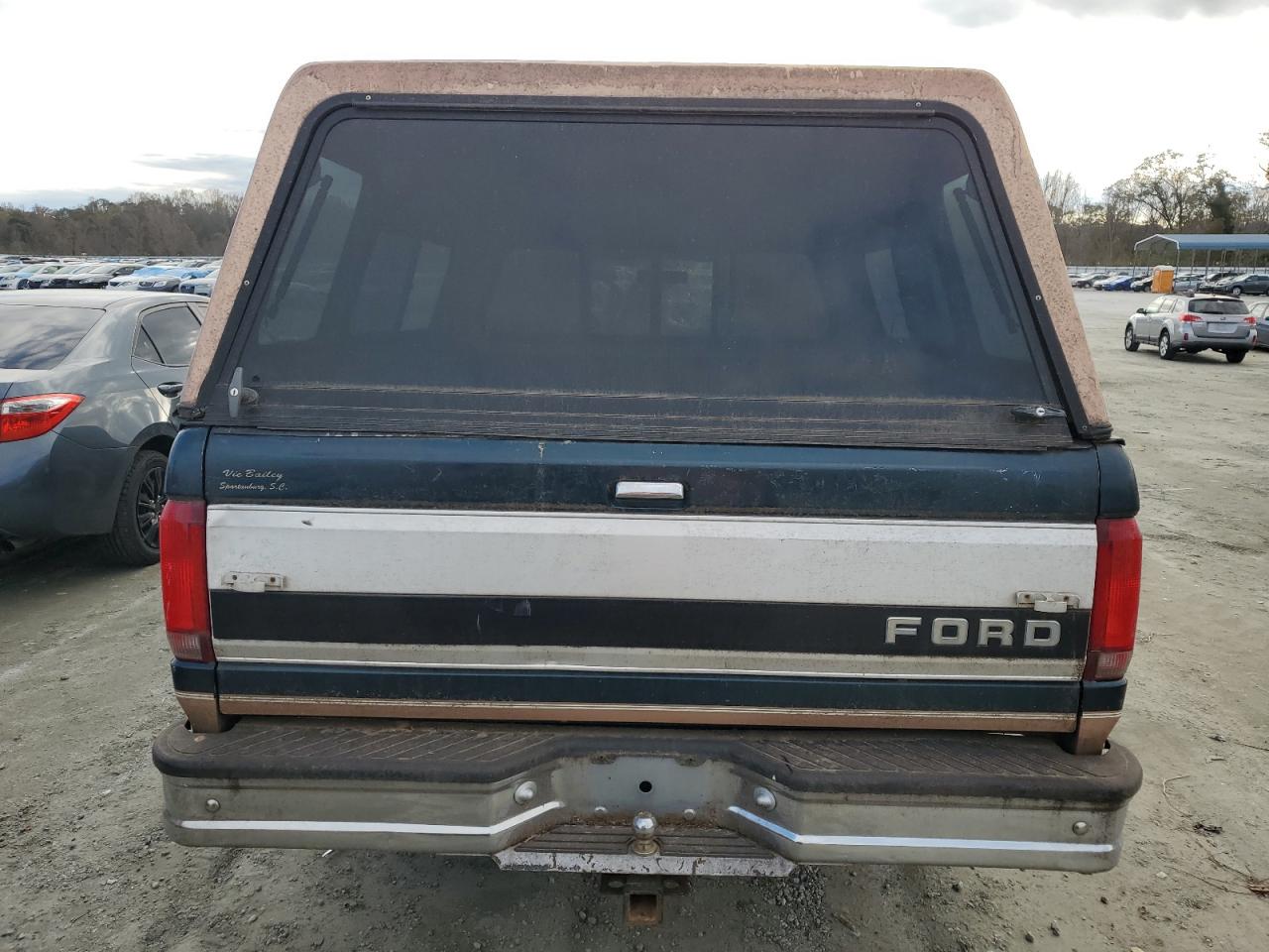 1995 Ford F-150 VIN 1FTEX15N9SKB25002 Copart auction photo, all over damage thumbnail 6
