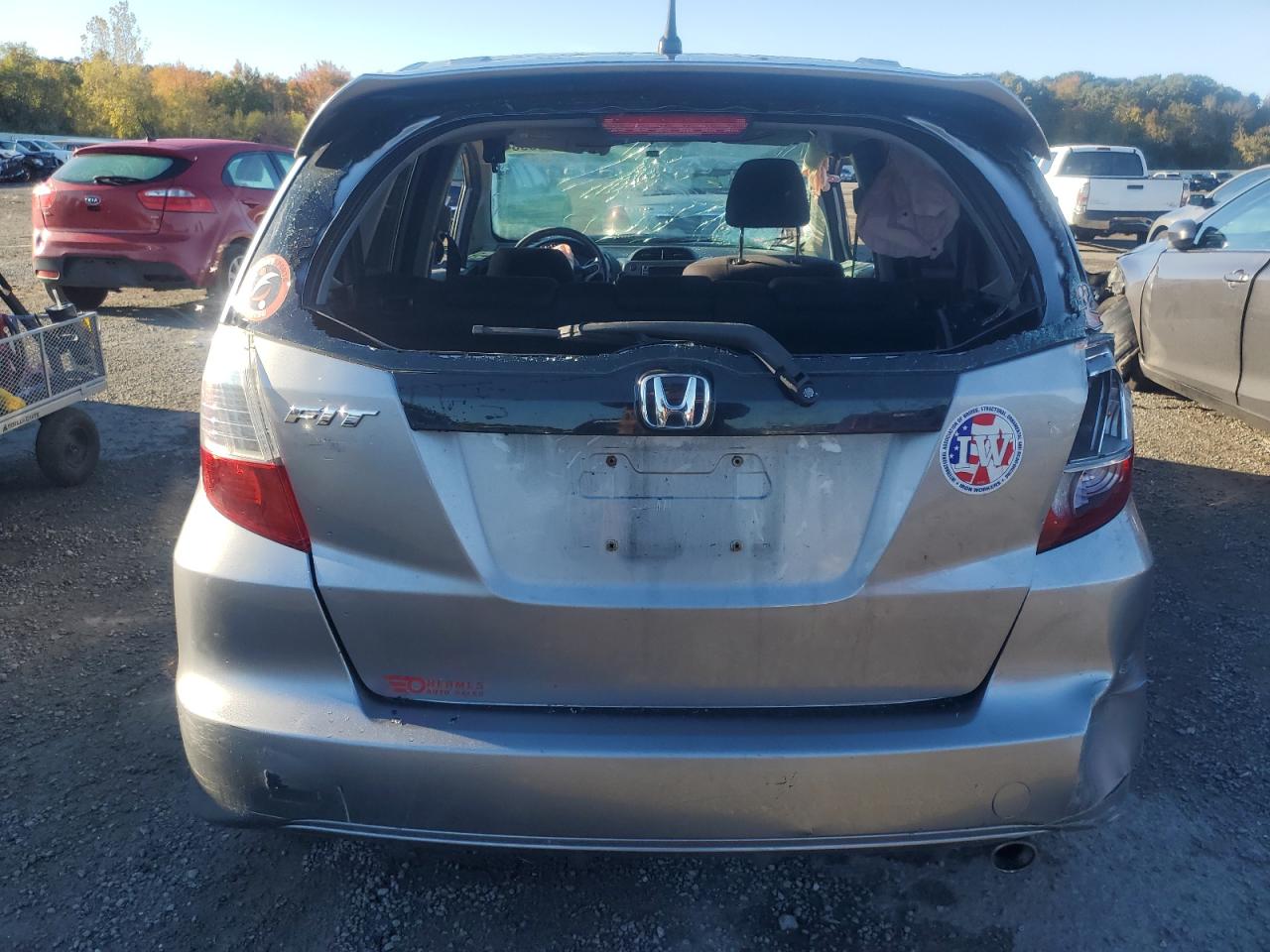 2009 Honda Fit VIN JHMGE88689S003476 Copart auction photo, all over damage thumbnail 6