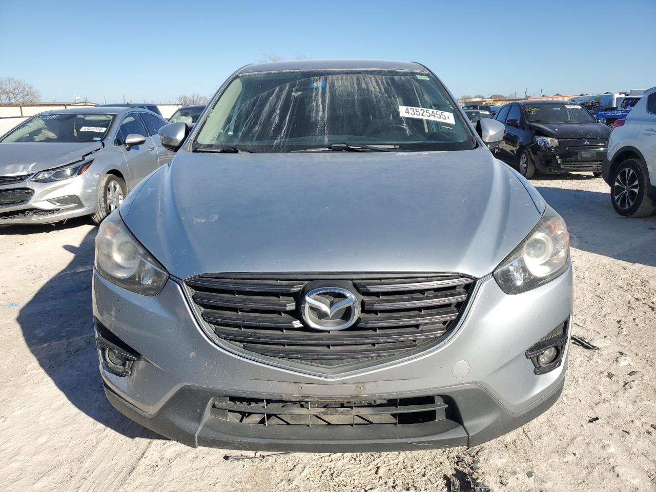 2016 Mazda CX-5 VIN JM3KE2CY3G0801160 Copart auction photo, rear end / minor dent/scratches damage thumbnail 5