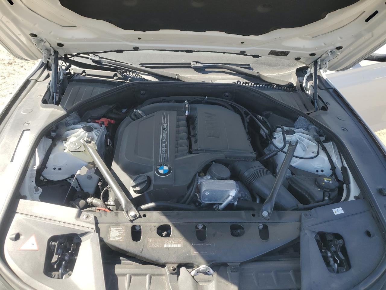 2015 BMW 7er VIN WBAYE4C54FD947298 Copart auction photo, side / front end damage thumbnail 12