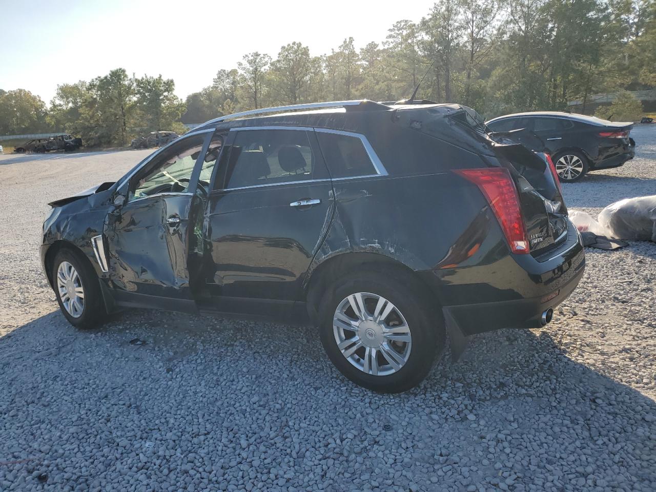 2014 Cadillac SRX VIN 3GYFNBE3XES662110 Copart auction photo, rollover damage thumbnail 2