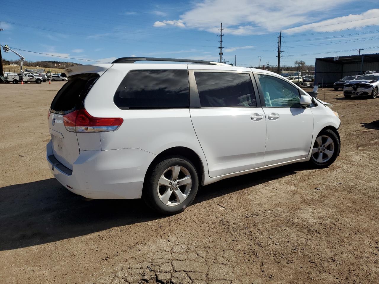 2014 Toyota Sienna VIN 5TDKK3DC0ES466086 Copart auction photo, front end / side damage thumbnail 3