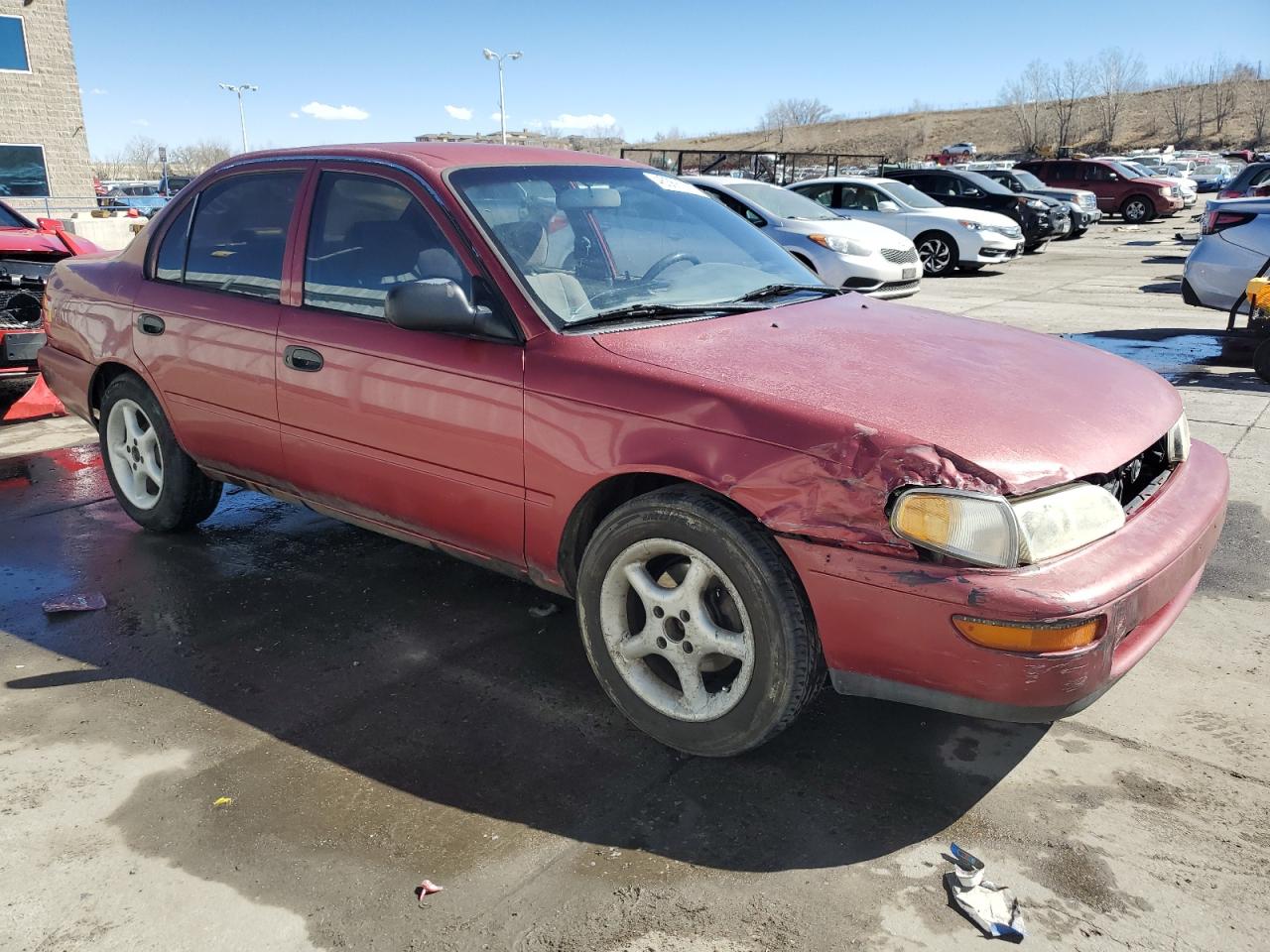 1995 Toyota Corolla VIN 1NXAE04B4SZ255310 Copart auction photo, front end / hail damage thumbnail 4