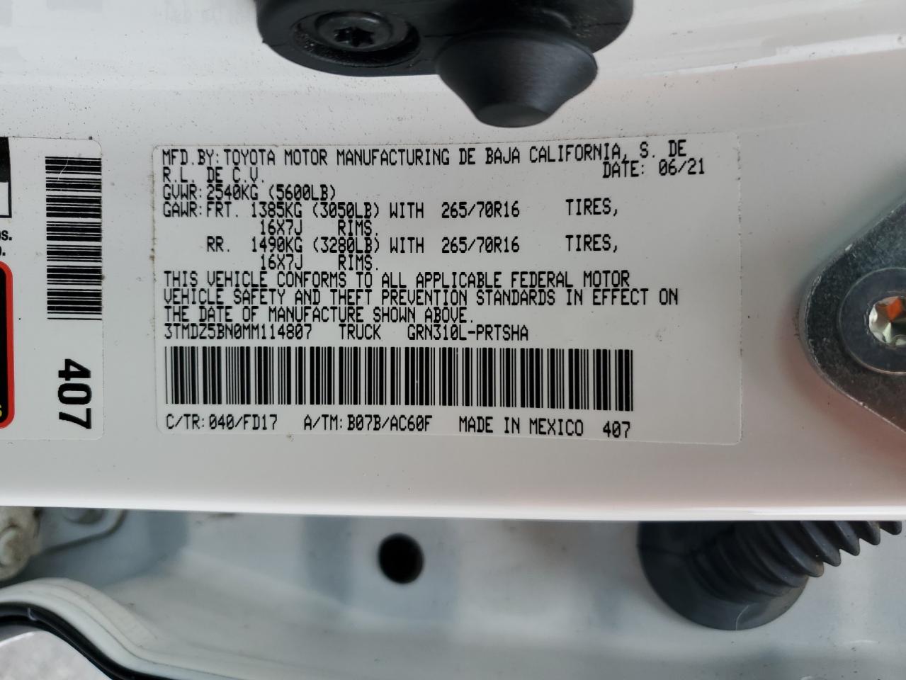 2021 Toyota Tacoma VIN 3TMDZ5BN0MM114807 Copart auction photo, rear end damage thumbnail 12
