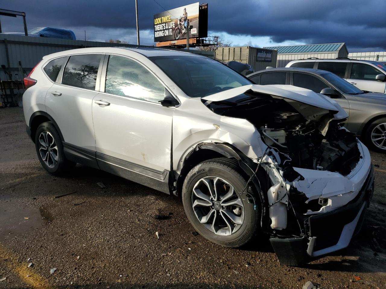 2022 Honda CR-V VIN 2HKRW2H52NH667759 Copart auction photo, front end / minor dent/scratches damage thumbnail 4