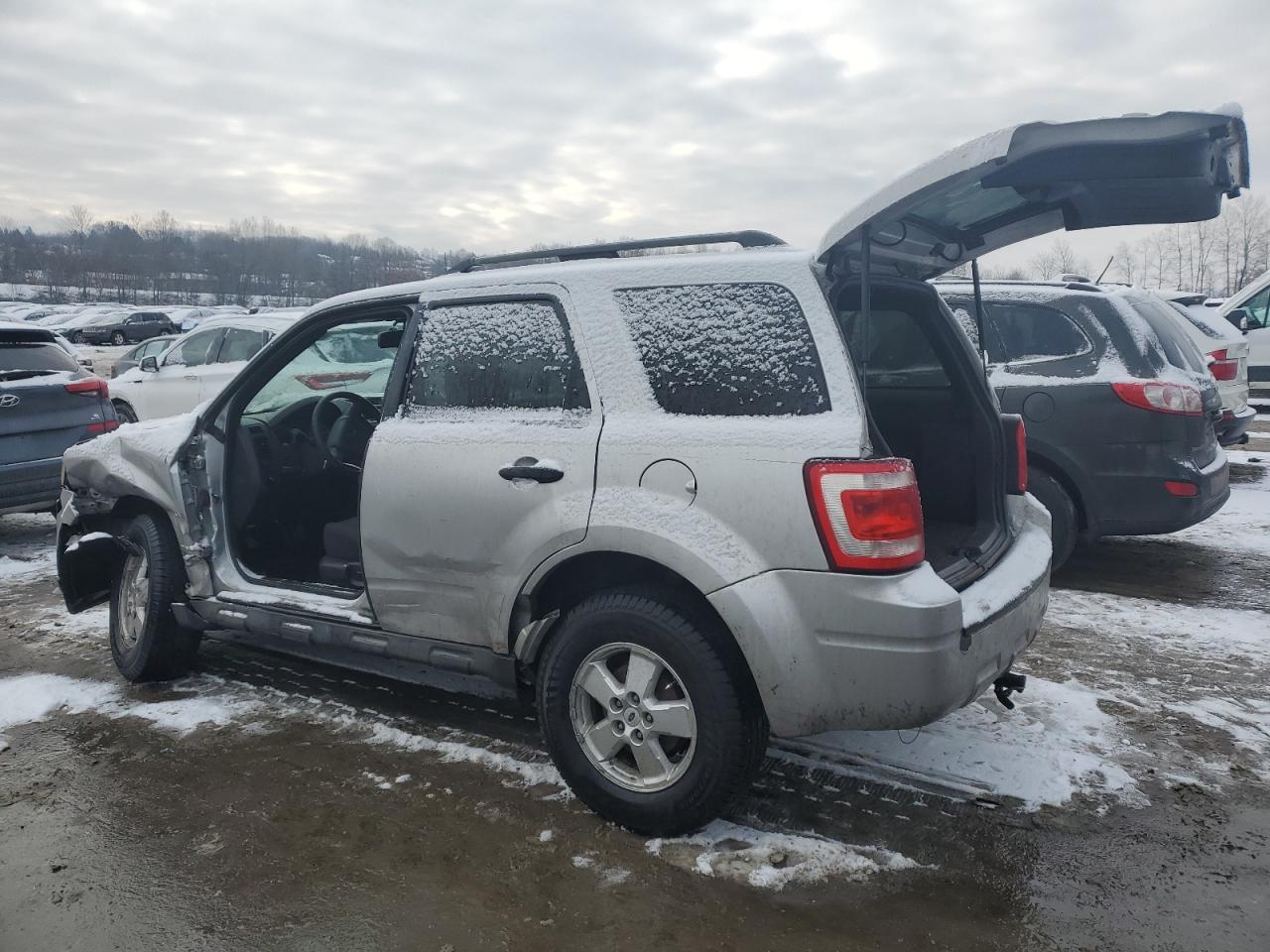 2010 Ford Escape VIN 1FMCU0DGXAKC64689 Copart auction photo, side / front end damage thumbnail 2
