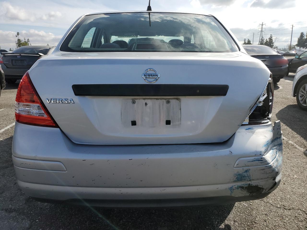 2009 Nissan Versa VIN 3N1CC11E39L461300 Copart auction photo, rear end / side damage thumbnail 6