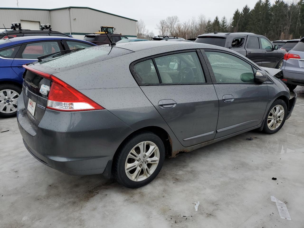 2010 Honda Insight VIN JHMZE2H71AS021255 Copart auction photo, front end / rear end damage thumbnail 3