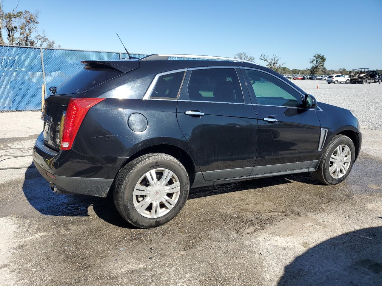 2014 Cadillac SRX VIN 3GYFNBE36ES677879 Copart auction photo, water/flood damage thumbnail 3