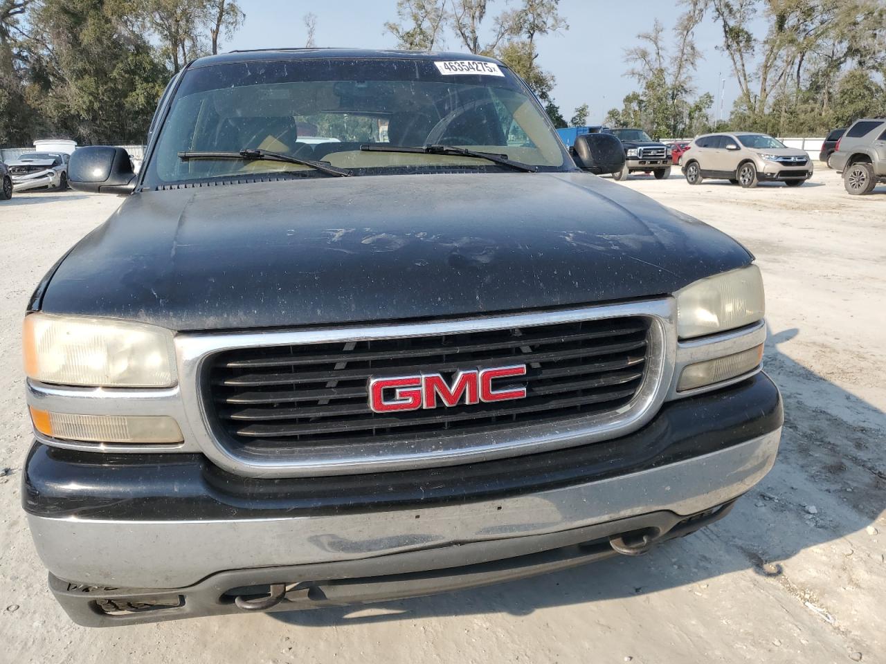 2000 GMC Yukon VIN 1GKEK13T7YJ160589 Copart auction photo, rear end / minor dent/scratches damage thumbnail 5