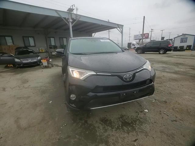 2018 Toyota RAV 4 VIN 2T3WFREV2JW477138 Copart auction photo, side / front end damage thumbnail 11